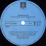 [Slika: 109271683_Miroslav_Ilic_1985_s_A.jpg]