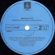 [Slika: 109271684_Miroslav_Ilic_1985_s_B.jpg]